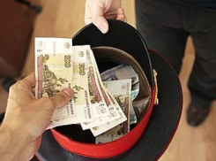 Сотрудника полиции обвиняют в мошенничестве