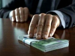 Передачу взятки предлагают признавать преступлением